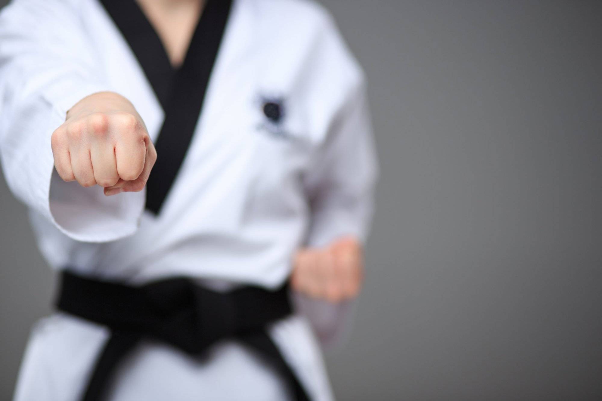 The karate girl with black belt The karate girl with black belt