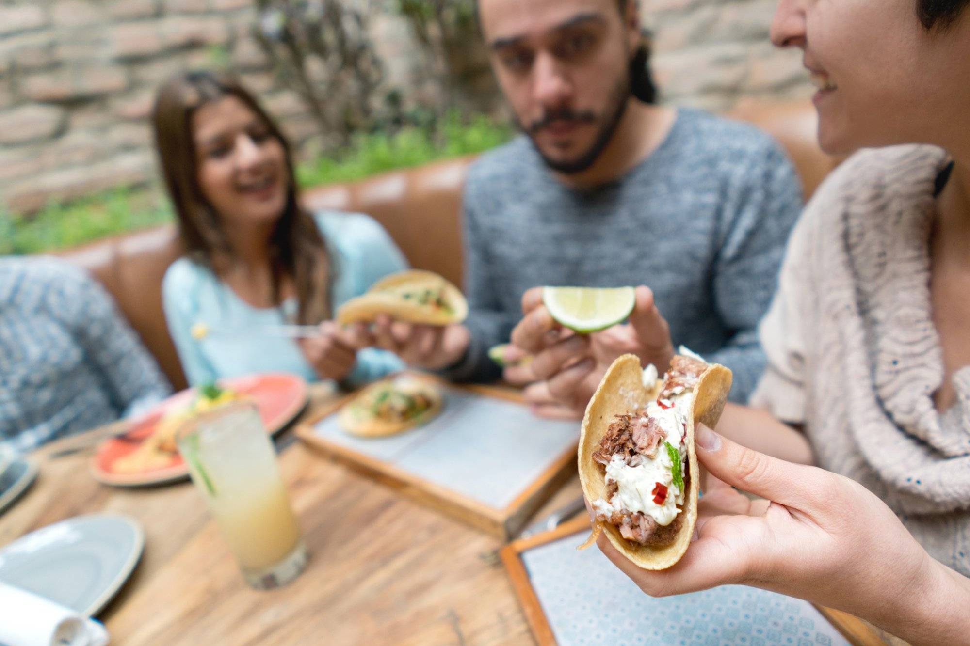 Friends eating at a Mexican restaurant